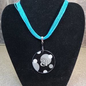 Pendant A silver/black/gray tone multiple uses